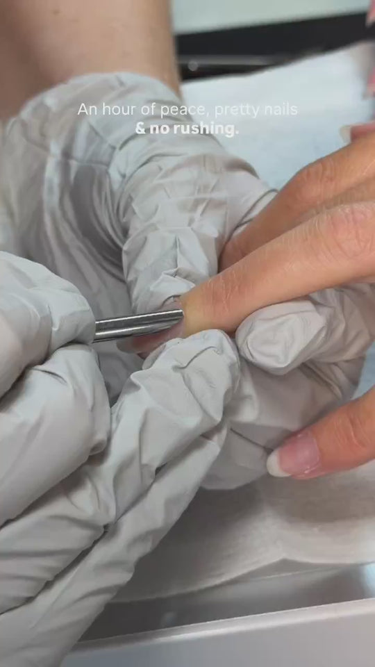 Cuticle prep before a BIAB manicure